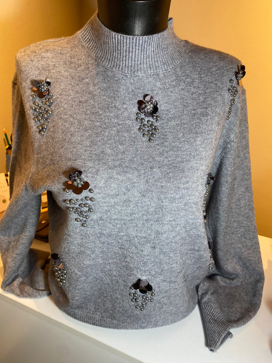 Grijze trui met parels