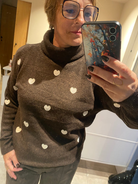 Trui met rolkraag en hartjes
